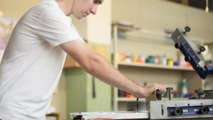 young-man-screen-printing